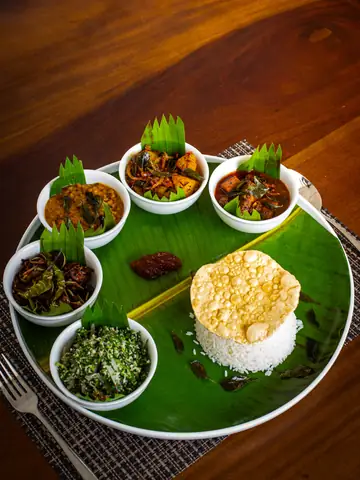 Sri Lankan rice and curry served on a banana leaf